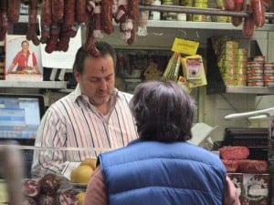The counterperson at Mike's wears ashes on his head received at church