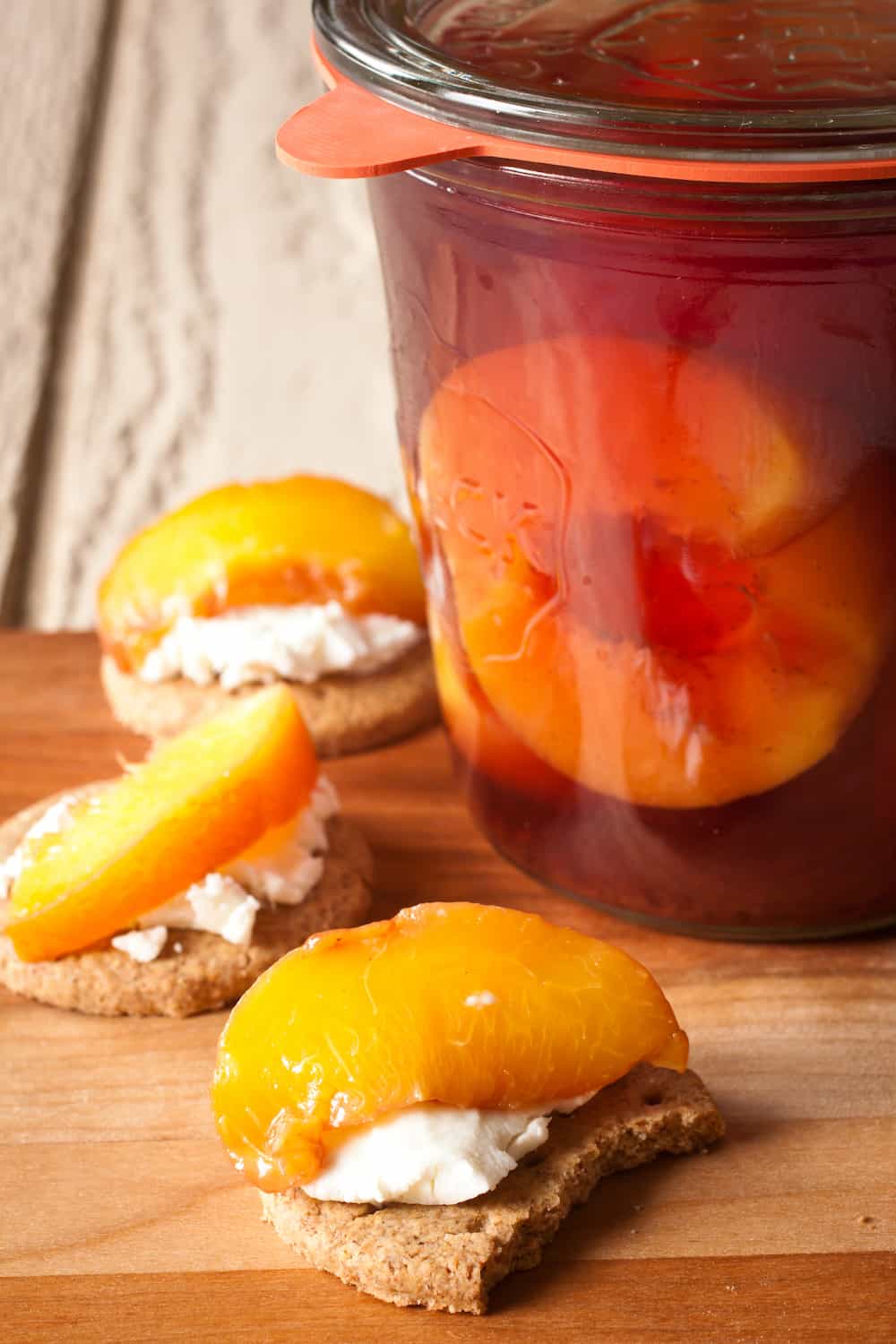 pickled peaches with cheese and crackers