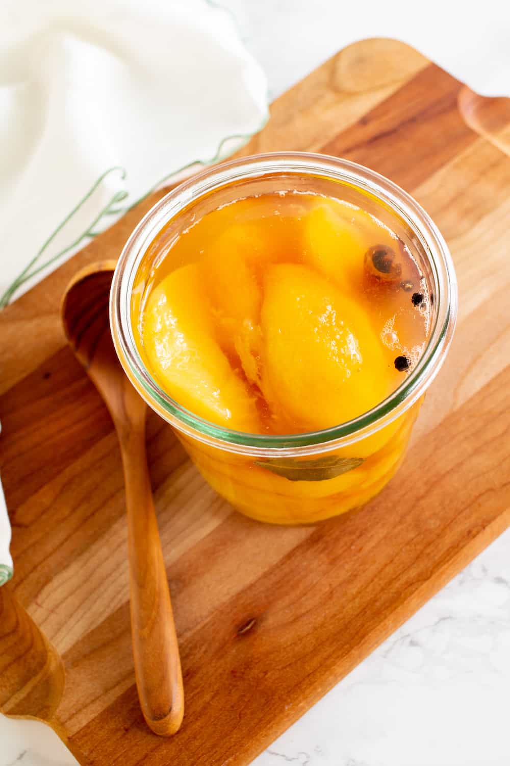 jar of pickled peaches