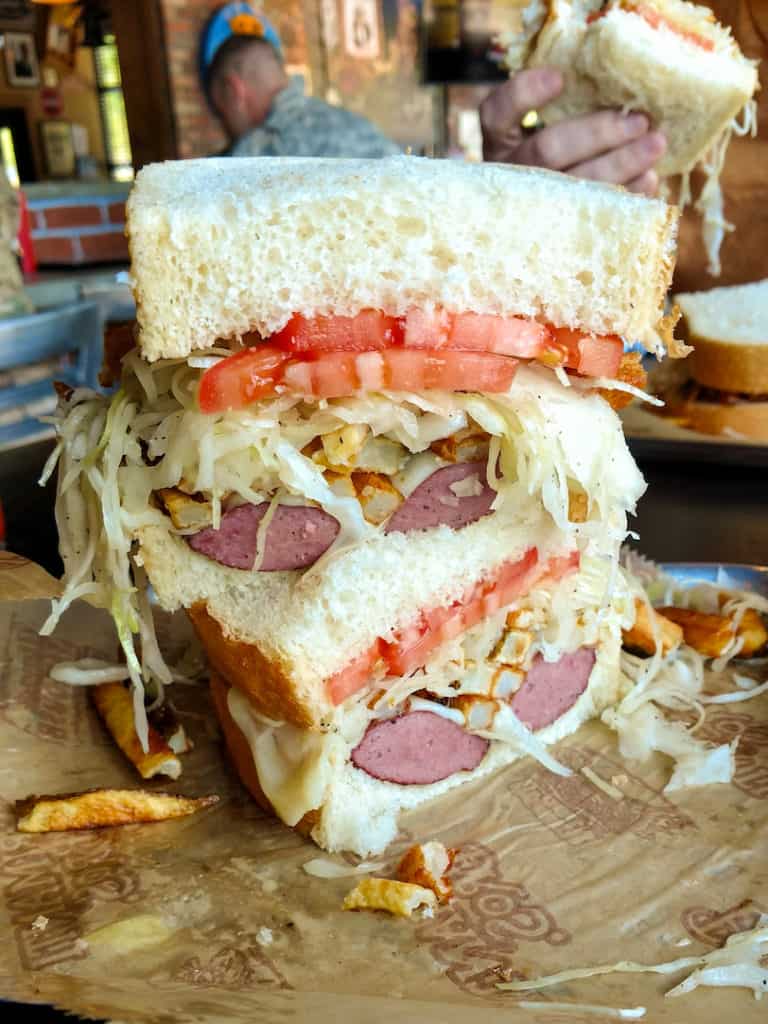 Primanti's sandwich in Pittsburgh with fries and coleslaw, via www.goodfoodstories.com