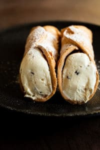 The many kinds of Italian pastry, like cannoli, struffoli, sfogliatelle, and minni di virgini, are sinfully delicious. But they have a religious history. #italianpastry