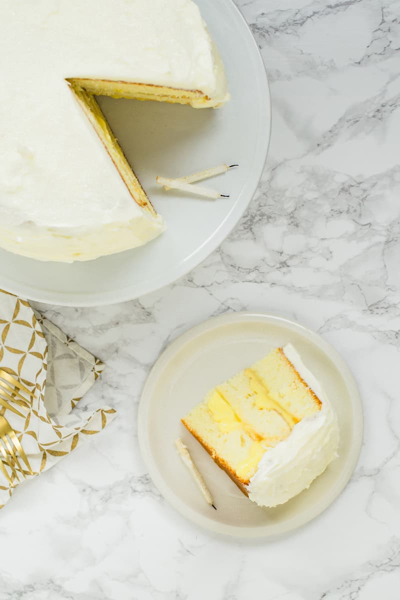This lemon Champagne cake is a special occasion stunner! Delicate cake layers with tart lemon curd and cream cheese frosting take it over the top.