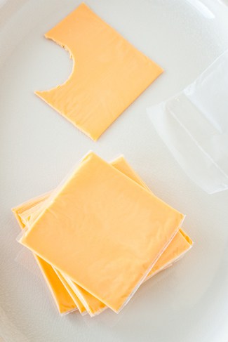 processed cheese slices, via www.www.goodfoodstories.com