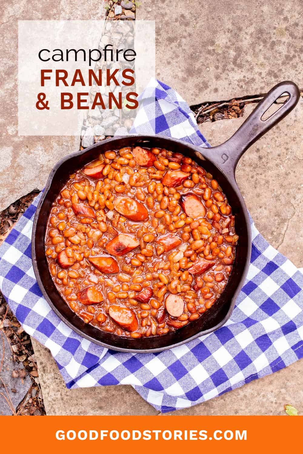 franks and beans in a cast iron skillet