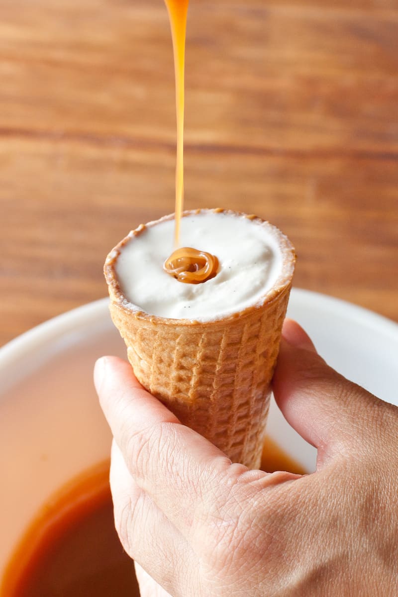 Homemade peanut butter caramel Drumstick cones topped with magic shell take the classic ice cream treat and turn it into something luxurious. #icecream #classicsnacksmadefromscratch